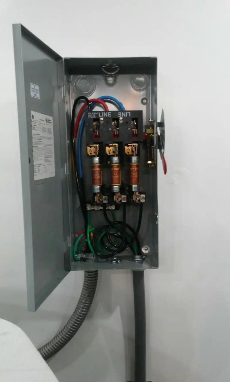 Three-phase disconnect switch installed for Smoke Detector Installation in Charlestown